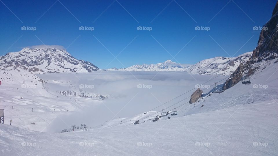 Perfect ski day. Photo was made on Glacier ski piste in Val D Isere ski resort. 