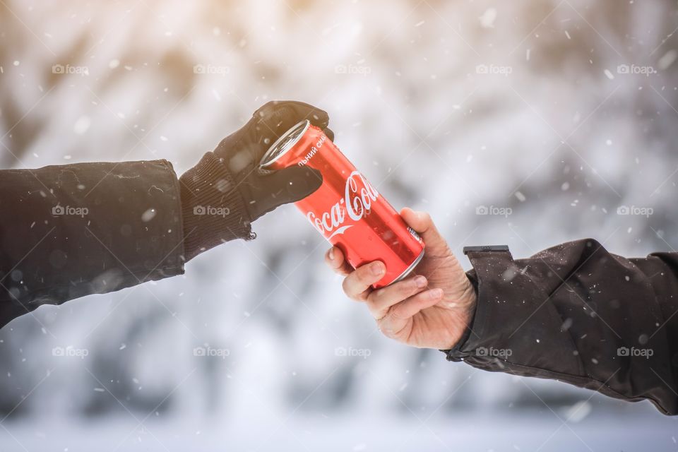 Holding Coca-Cola 