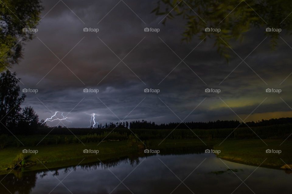 Lightning on the background of the night sky