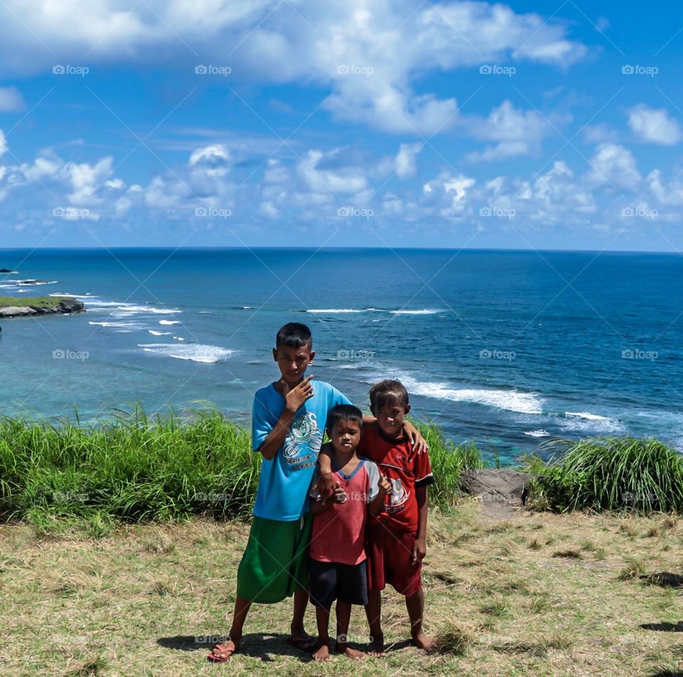 The Local Kids help us as a tour guides at the Island of Guinahoan, Caramoan, CamSur, Philipppines
