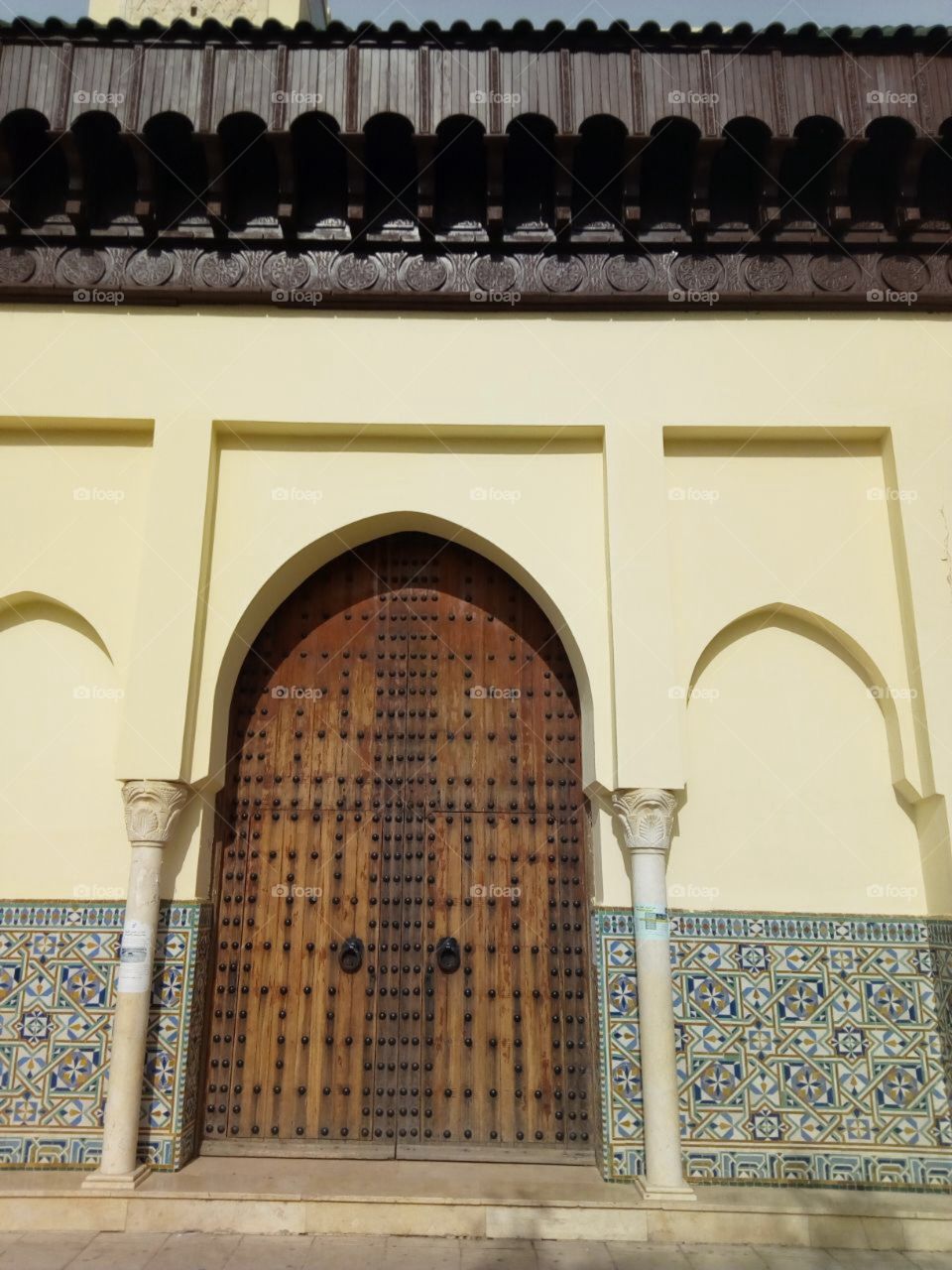 This picture embodies the art of sculpture at the doors and the culture of Morocco emerged