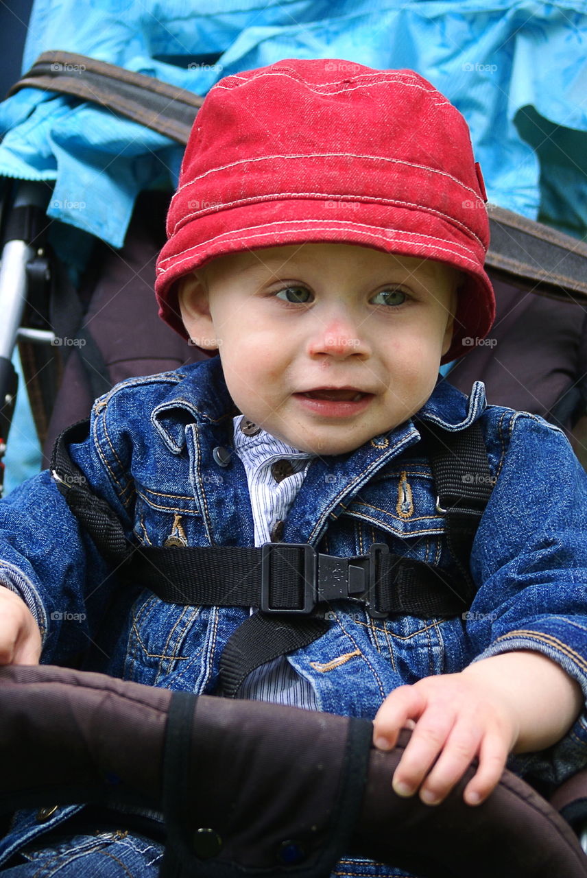 Cute toddler in the stroller