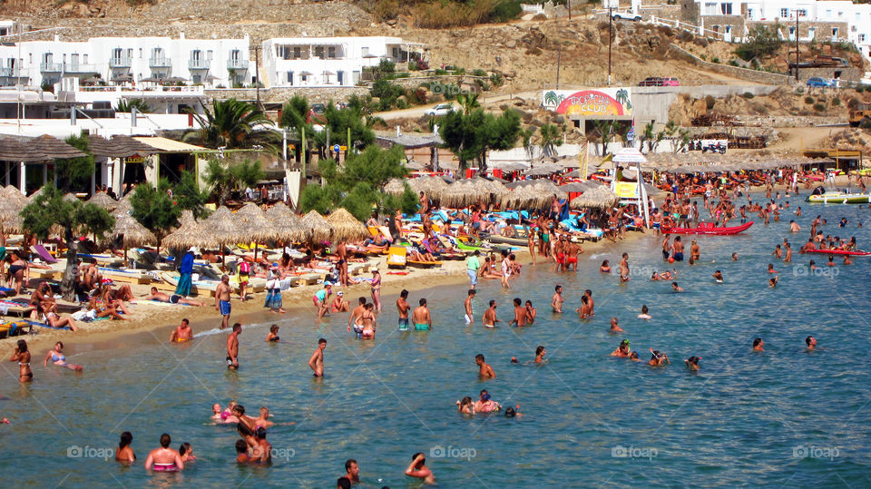 mykonos island paradise beach. greek crowded beach