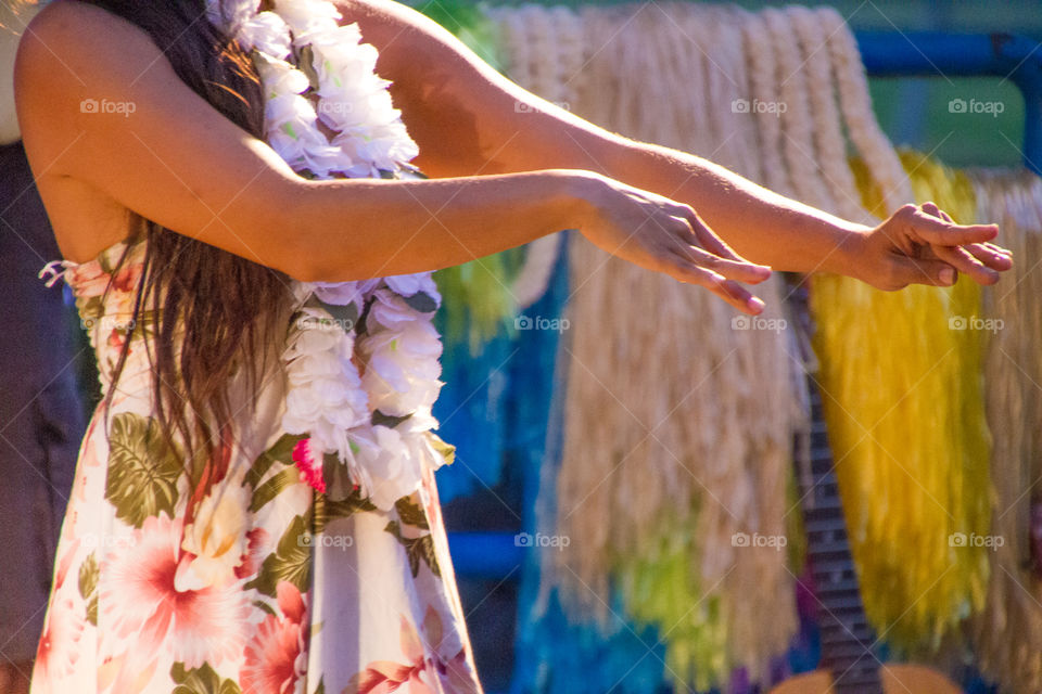 Hawaiian hula dancer performing along the streets of Kona.  