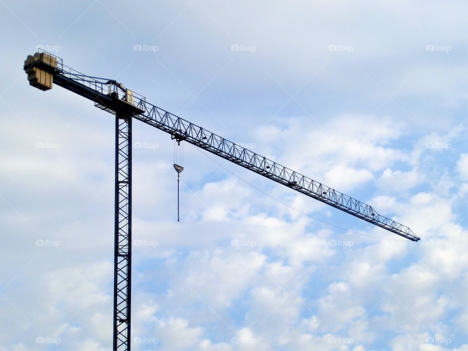 Tower crane against the sky