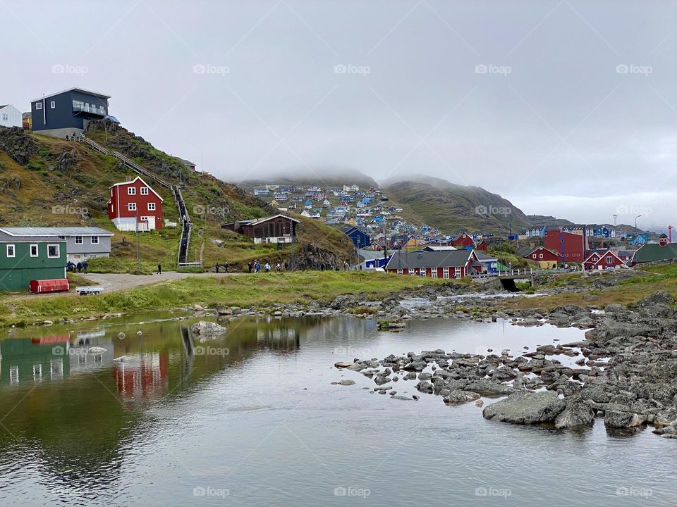 A stream running through a small town in Greenland 