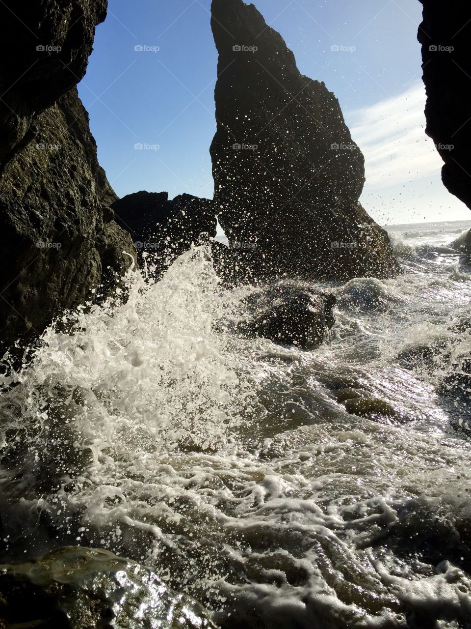Waves crashing into the rocks