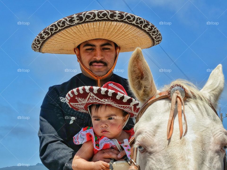 Festive Mexican Vaquero with Daughter