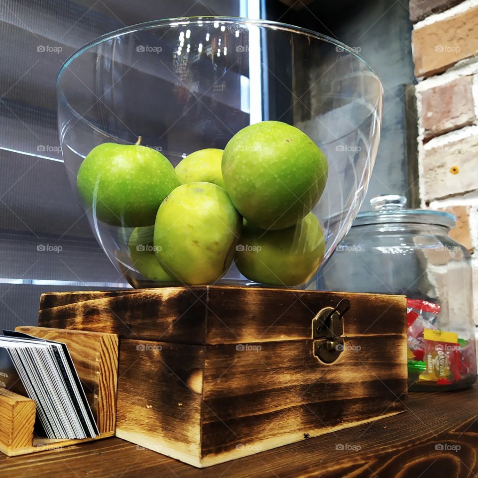 Green apples on the box