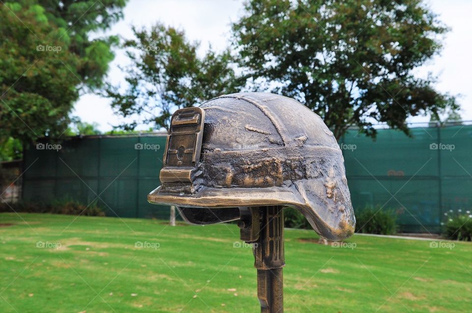 Military helmet statue