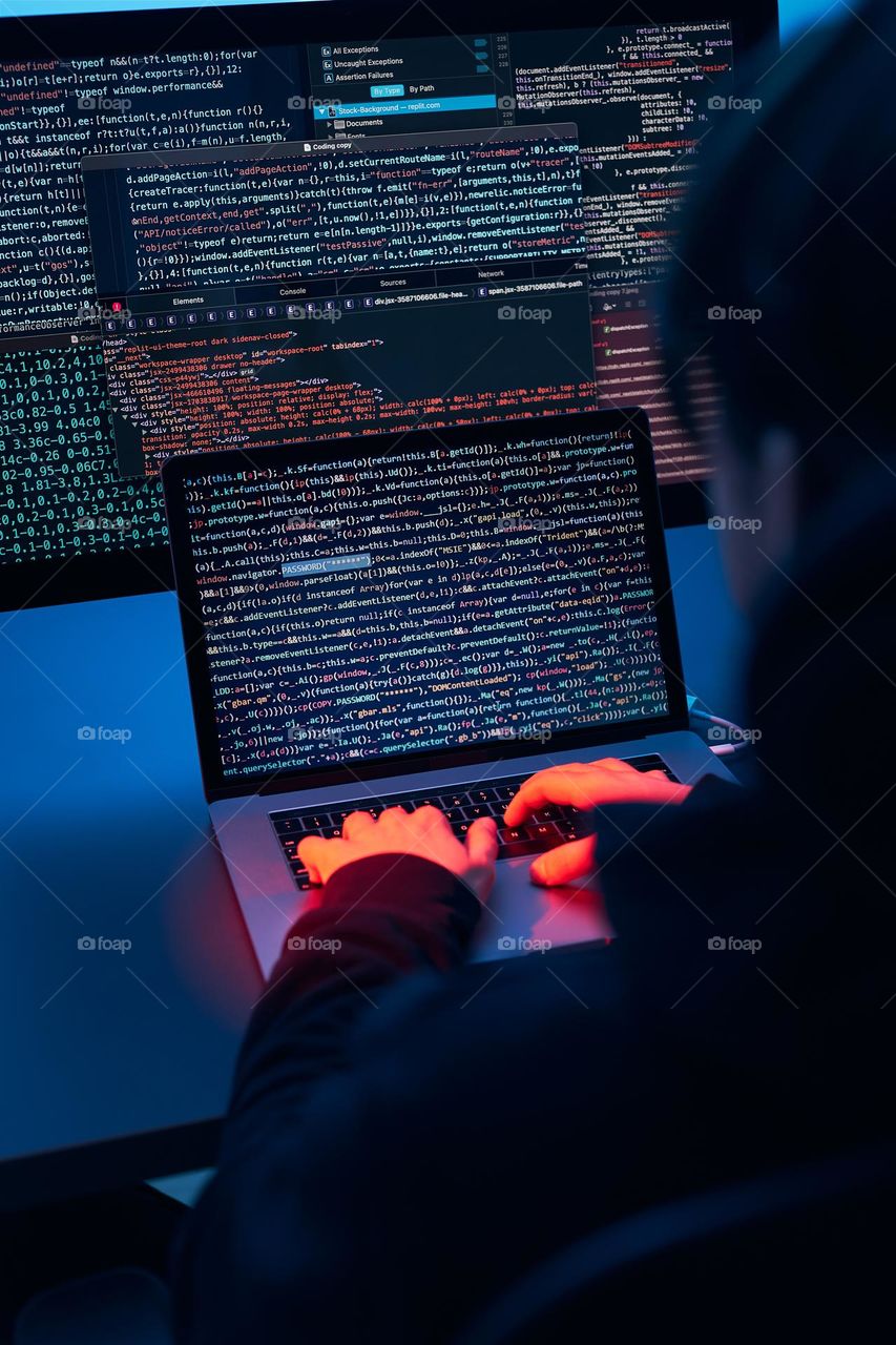 Man using computer and programming  to break code. Cyber security threat. Internet and network security. Stealing private information. Person using technology to steal password and private data. Cyber attack crime