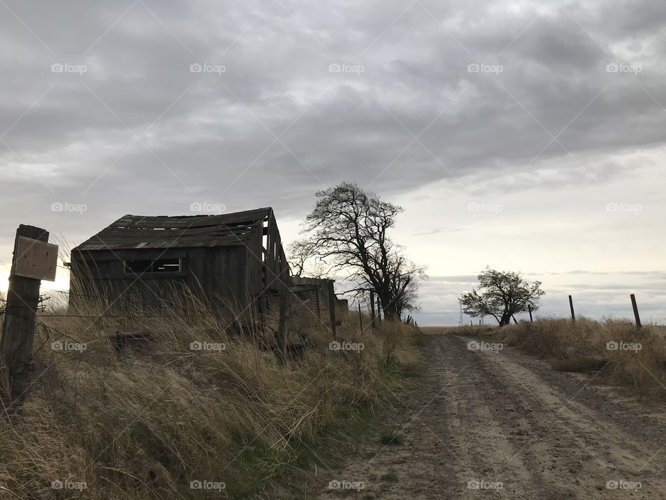 Old wooden building I ran across while on a job. Middle of nowhere Washington. The clouds and lighting just seem to fit the feel of the building 