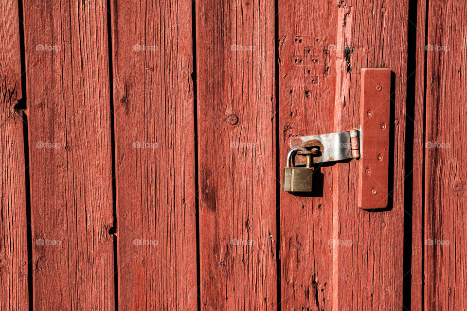 Door lock on the old wooden door