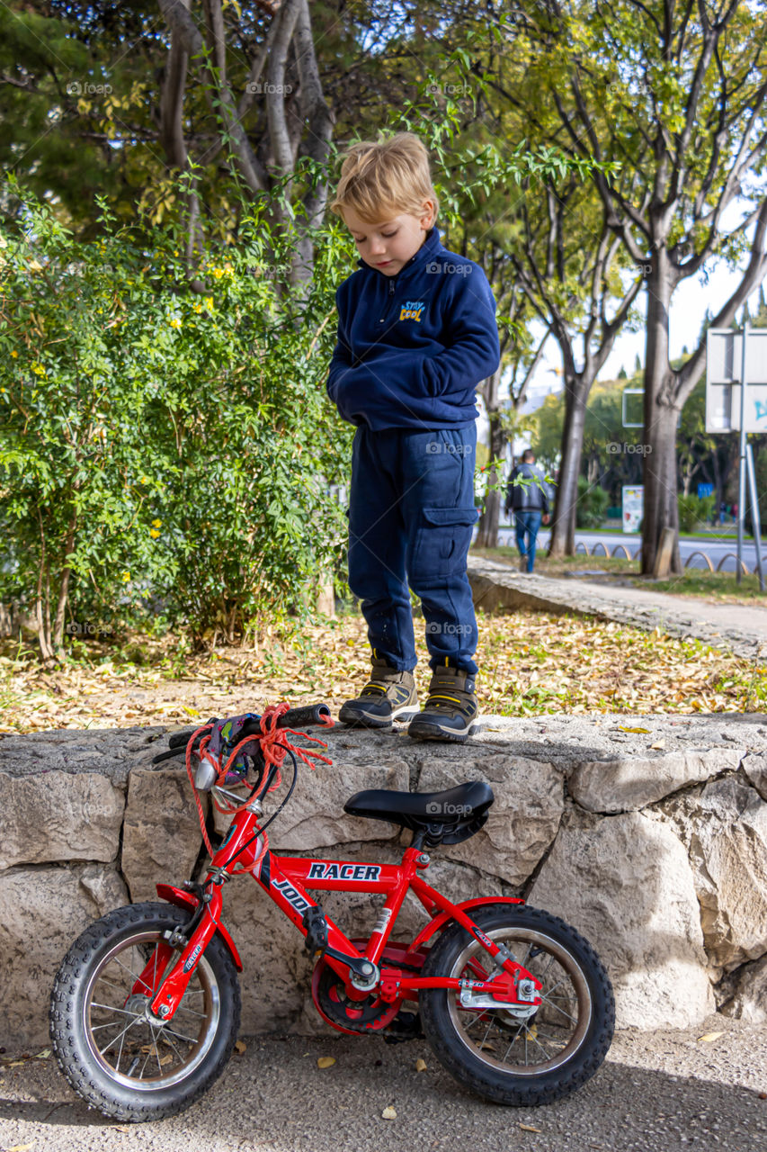 A boy and his bicycle