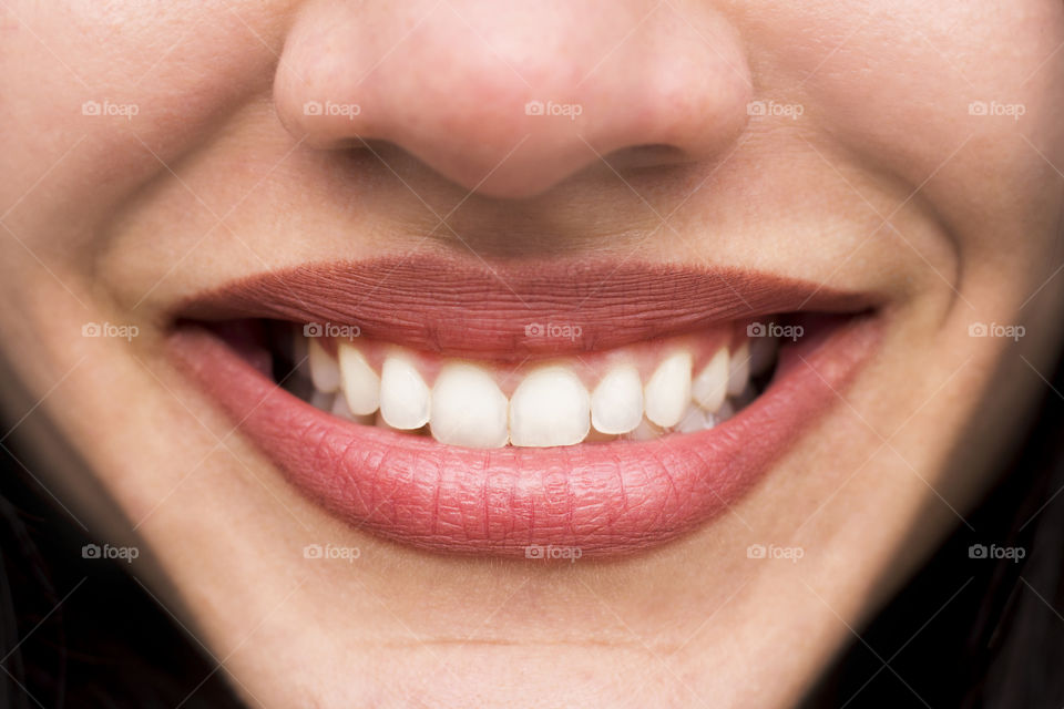 Teeth smile of beautiful woman, close up mouth