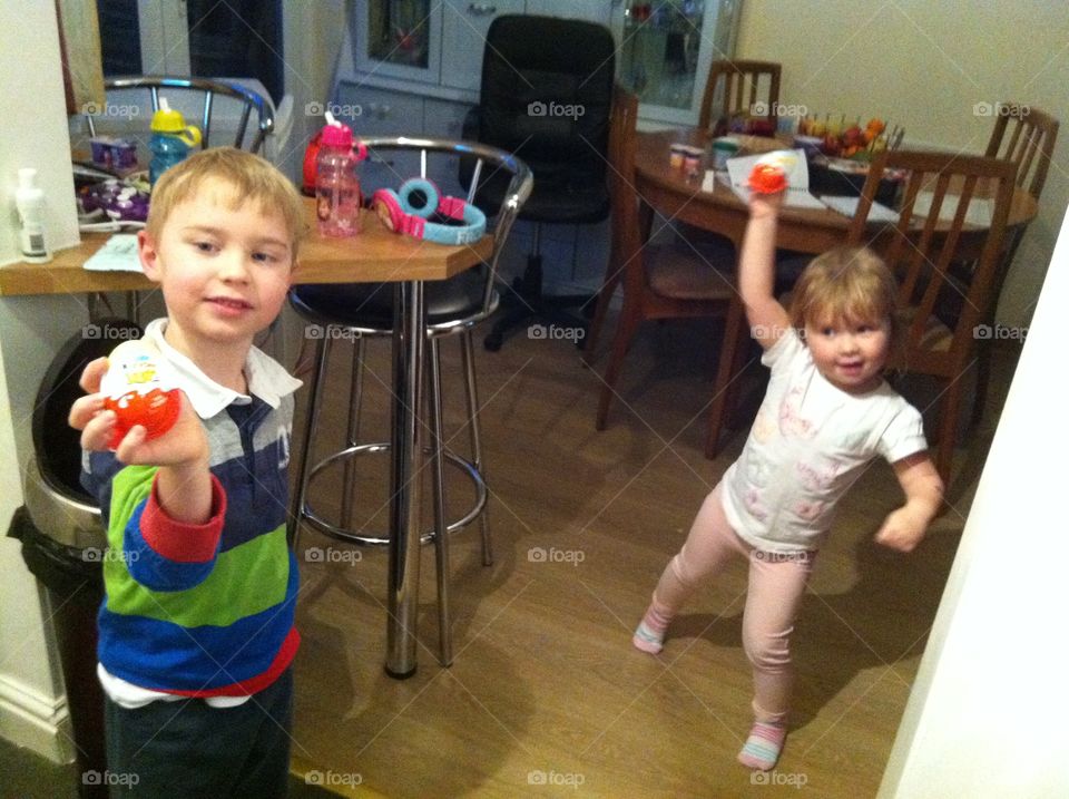 Children holding chocolate in hand