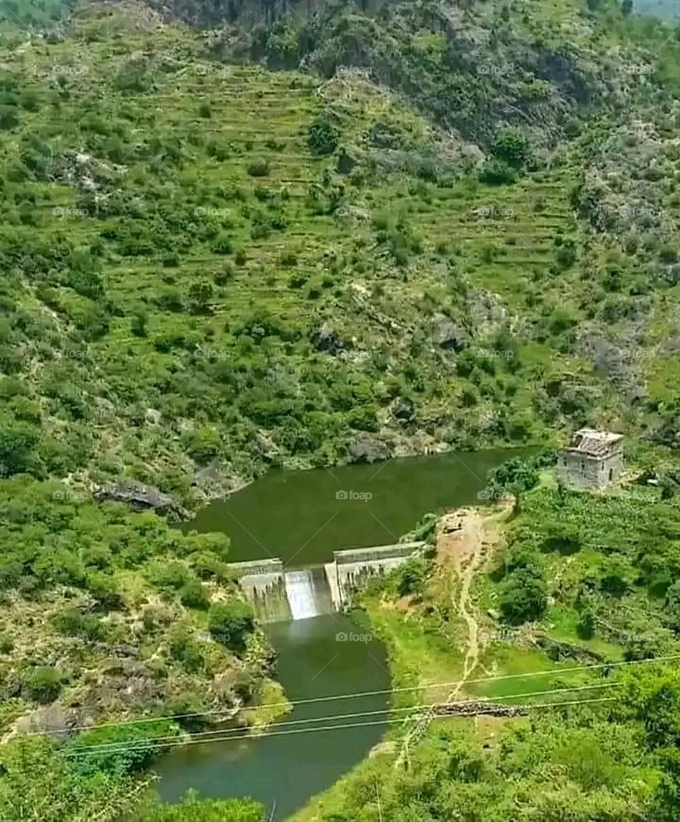 Glory be to God, the magnificent and picturesque view and the natural green trees are a view that is nothing more wonderful than it