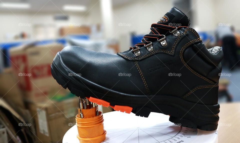 Safety shoes are special shoes made to protect the feet of workers from dangerous objects when working