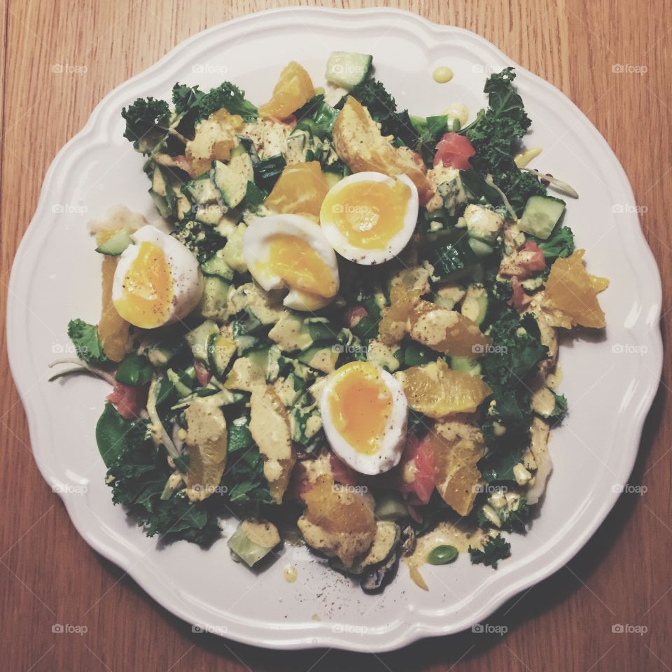 Salad dish with egg and vegetables