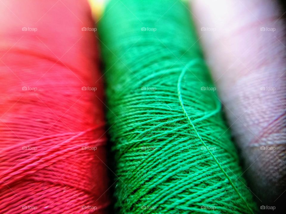 Close app of the colorful threads.