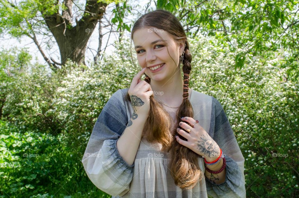 Happy cheerful woman laughing. Outdoor portrait of a beautiful natural lady