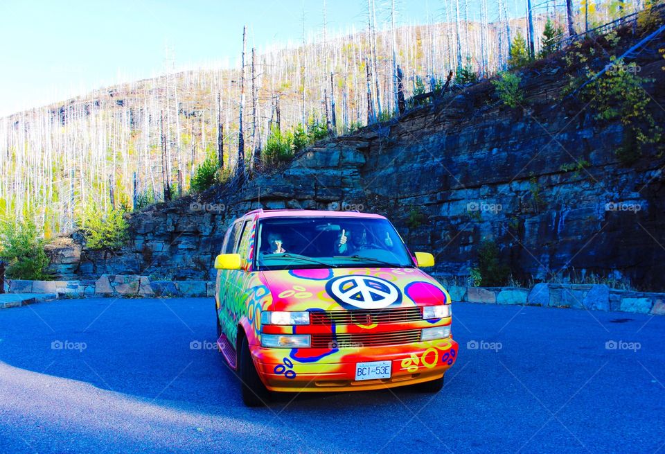 A sharp color painted car in the nature in glacier national park