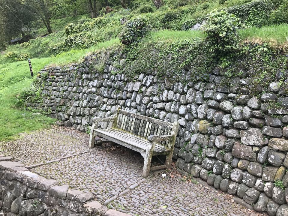 If you are going to sit somewhere make it count, imagine the toil of folk required to build the wall that protects this seating provision.