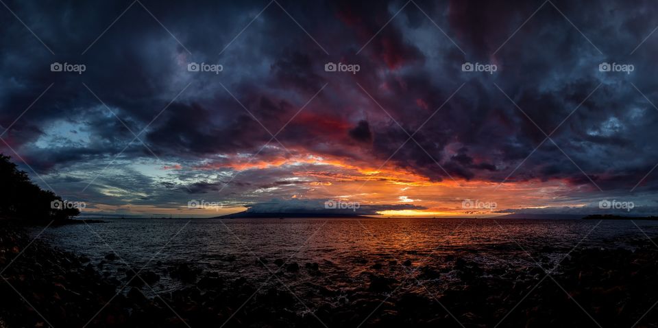 Cloudy sky against sea during sunset