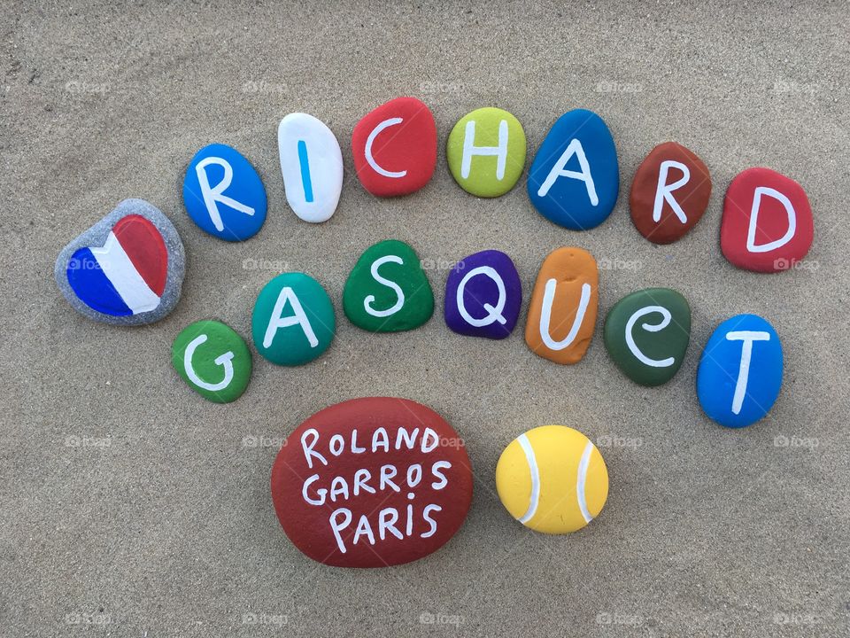 Richard Gasquet, french professional tennis player at Roland Garros, souvenir on colored stones 
