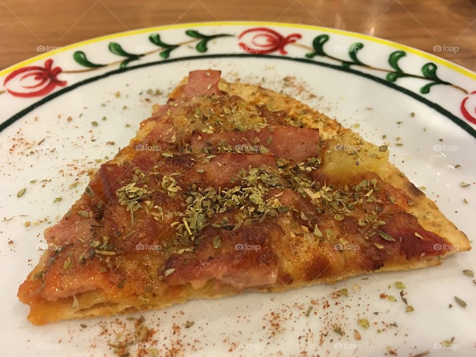 a slide of pizza