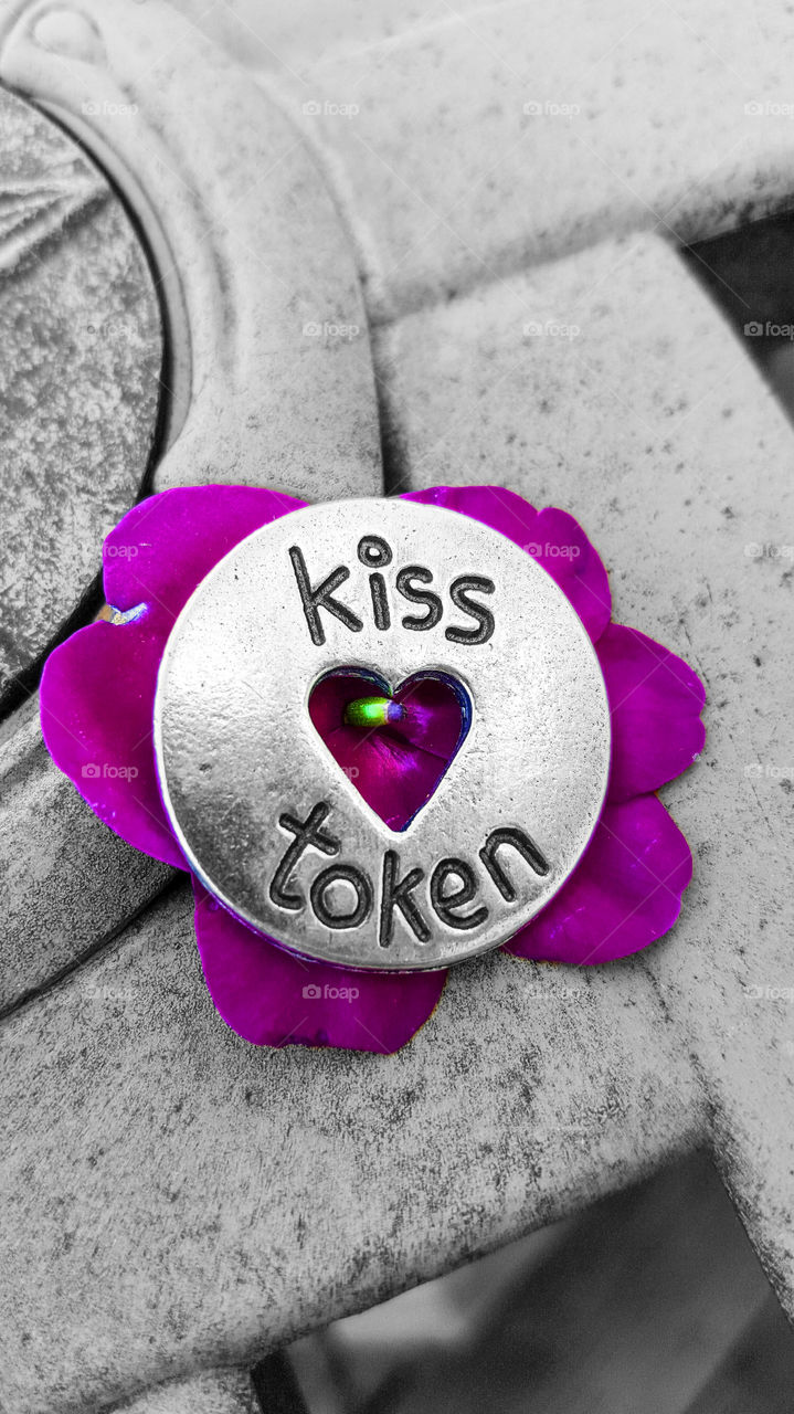 Kiss token. Kiss token with flower