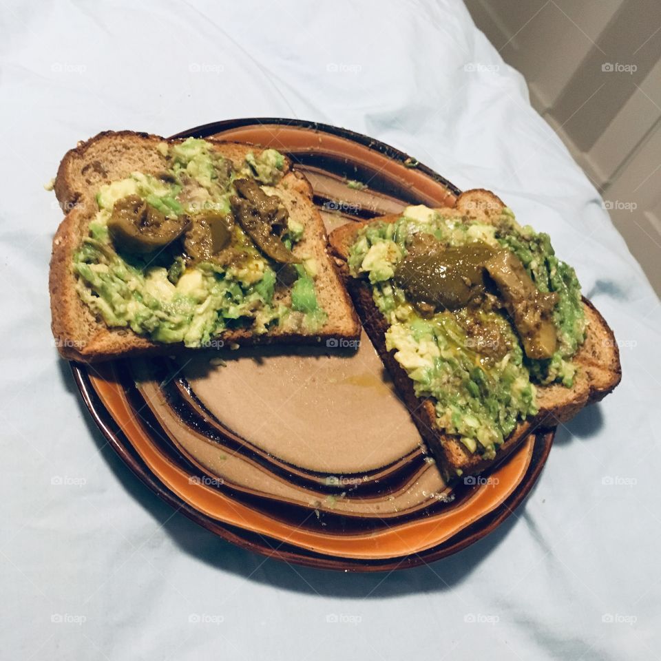 Some avocado toast with pickled spicy mango 