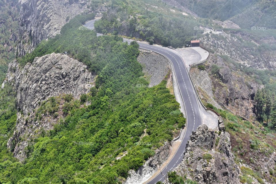 winding mountain road on la gomera canary island in Spain top view