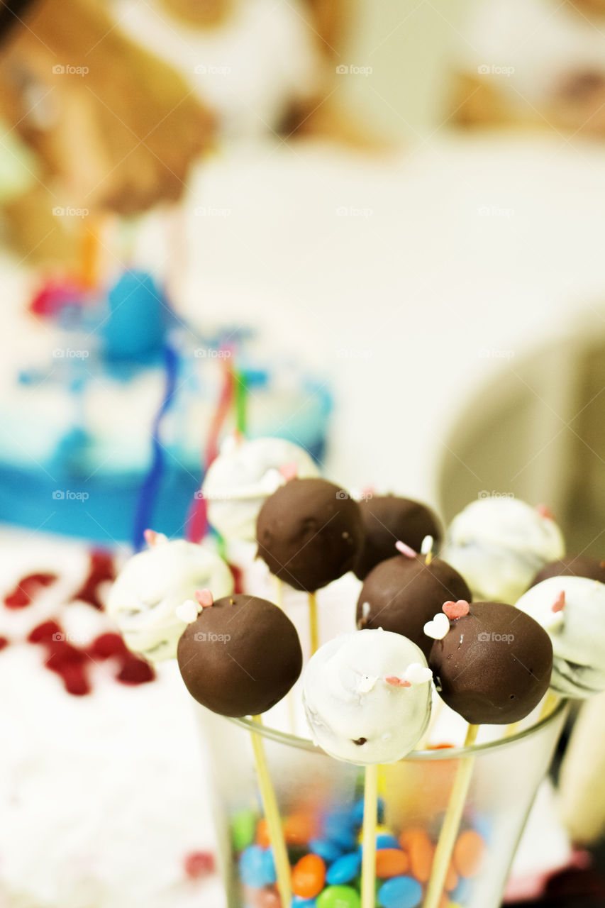chocolate balls. chocolate balls on a stick for children birthday