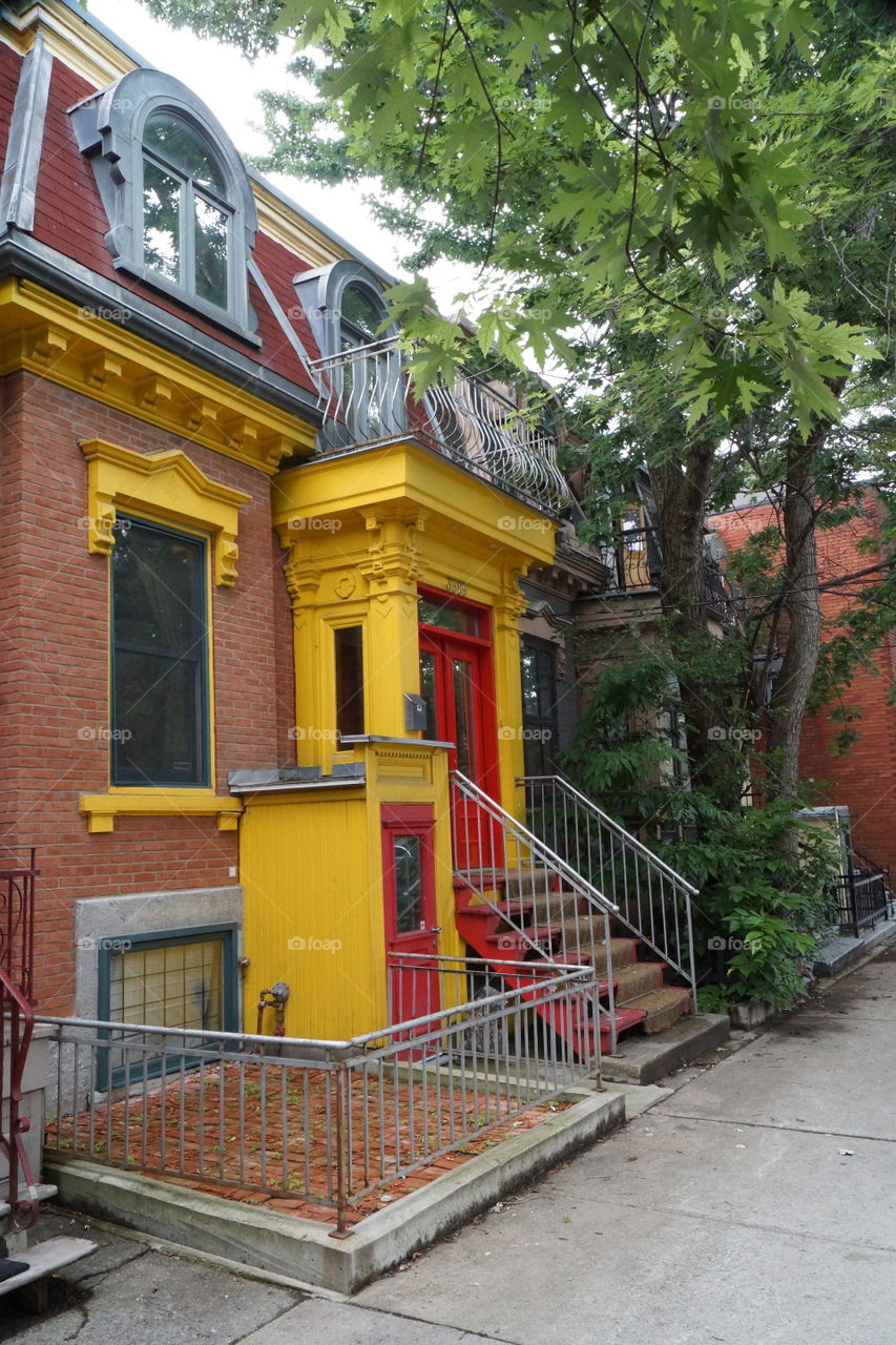 Yellow and red door of a Victorian house