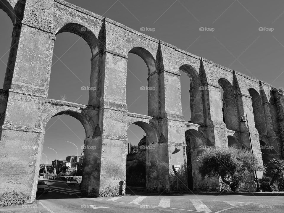 ancient roman aqueduct in the city center