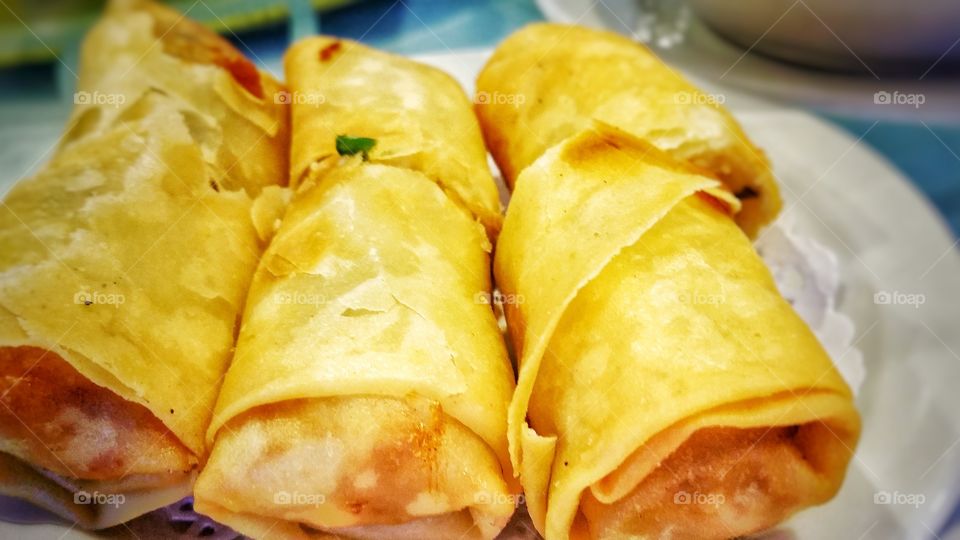 Chinese spring rolls. Crispy pastry filled with a variety of meat and vegetables.  These rolled appetizers are typically served as part of dim sum or yum cha. Popular in East Asian and Southeast Asian cuisine. Also called Chun Juan in Chinese.
