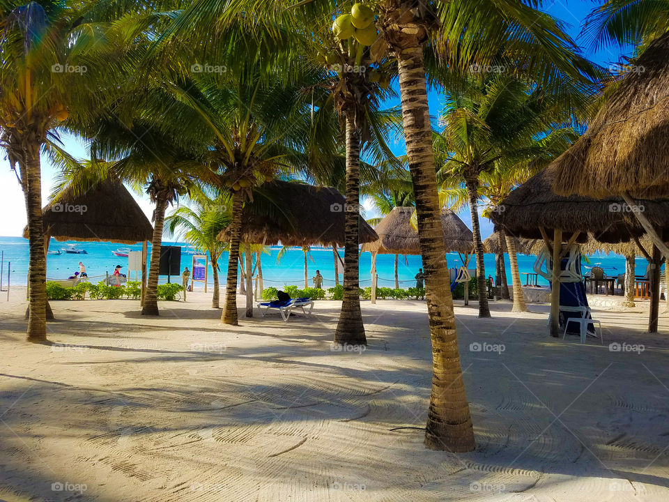 early morning empty beach on the shores of Akumal