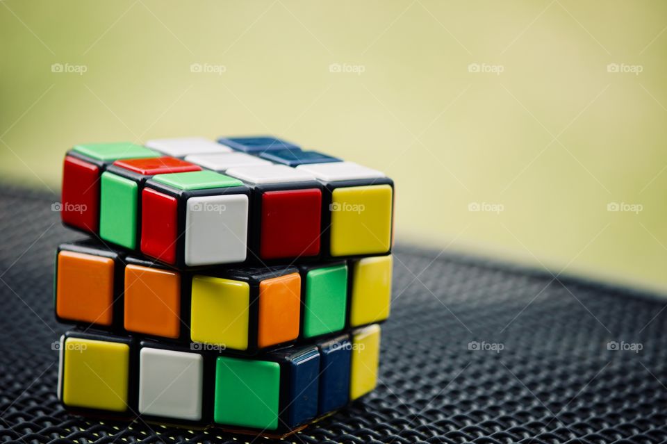 Rubik’s cube resting on the table 