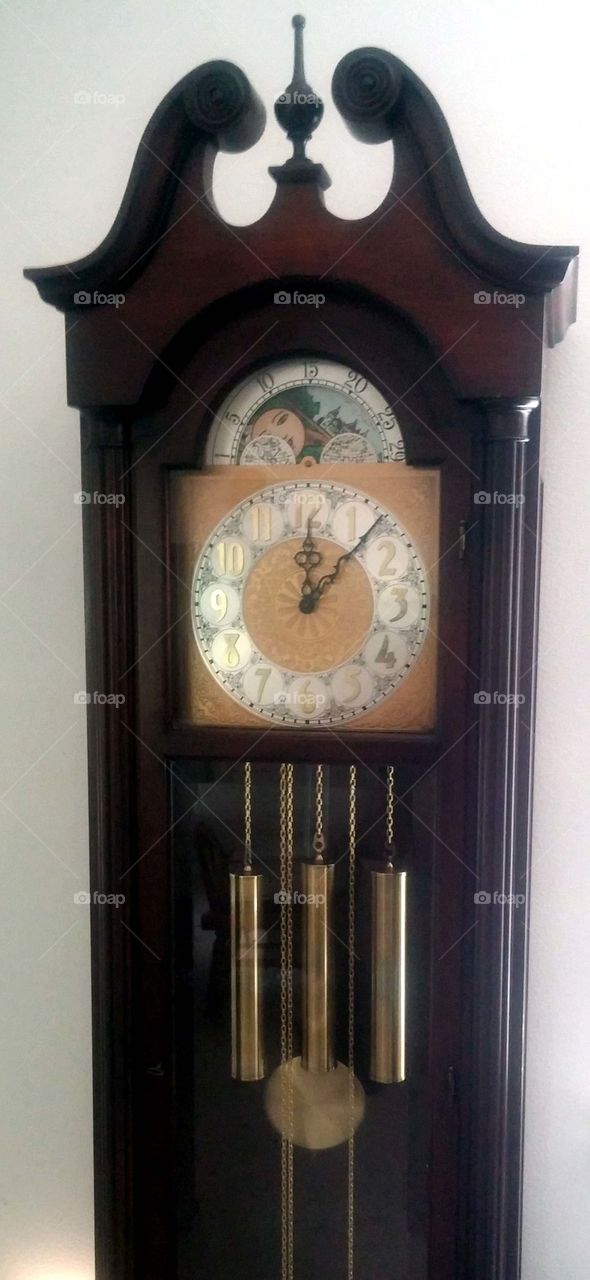 ten after twelve. grandfather clock