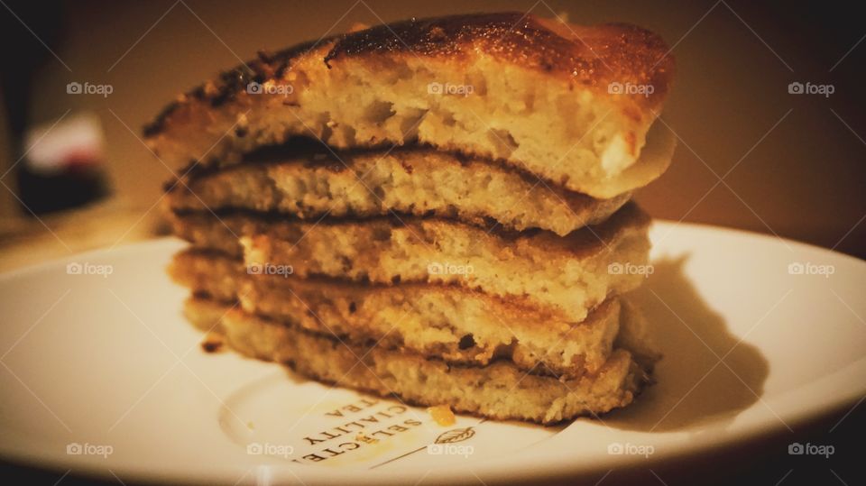 Stack of pancake with bite eaten