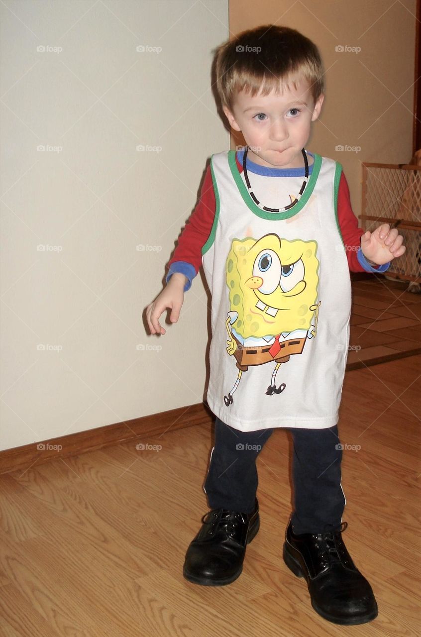 Funky outfit, little boy who dressed himself complete with his grandfather’s shoes