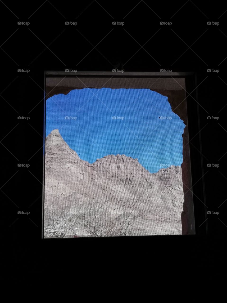 a piece of Sinai mountain of Egypt, as seen from inside of the house