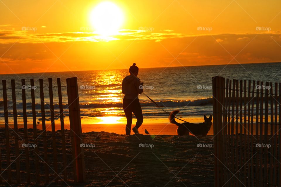 walk on the beach at sunrise