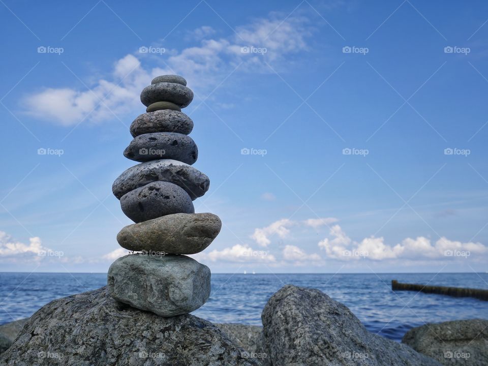 Stacked stones at shoreline