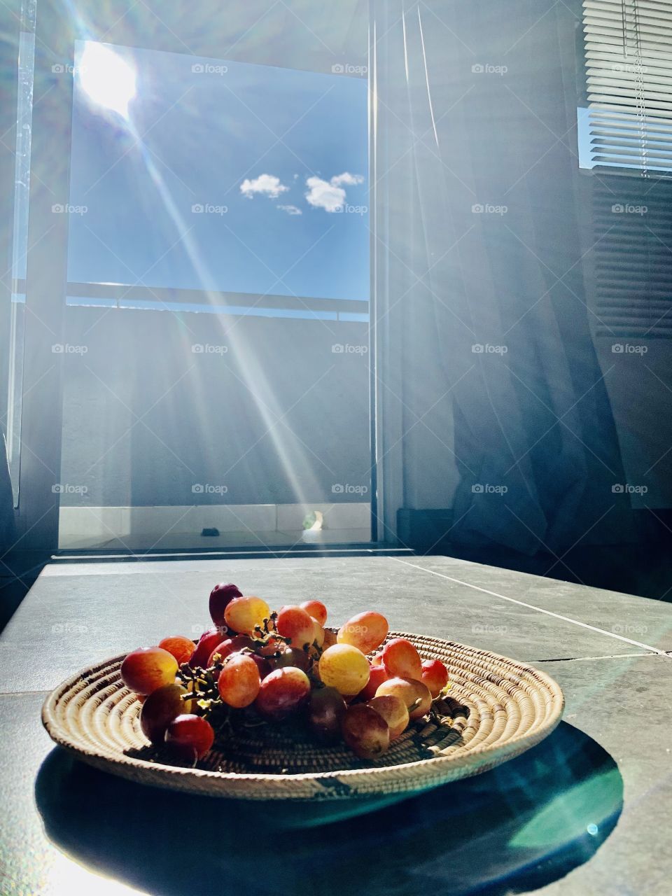 I always take pictures of my snacks. Having fresh red grapes today. Look for the best lighting I open my balcony door for the sun rays to come in.