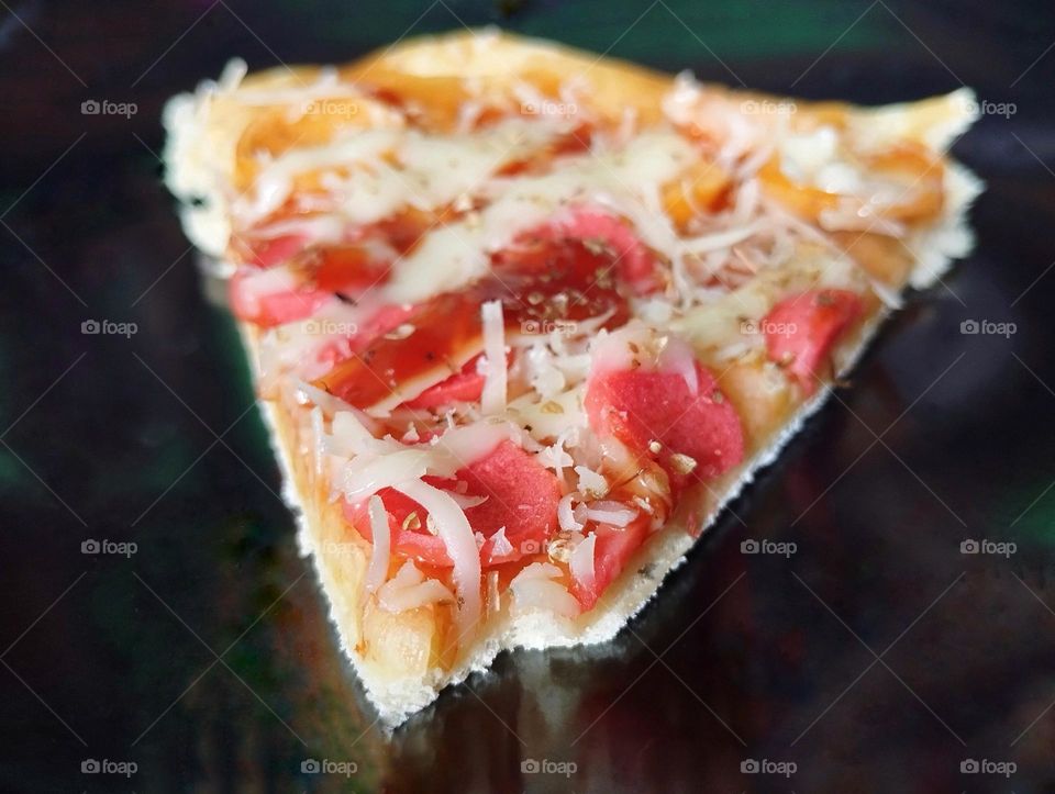 A slice of pizza