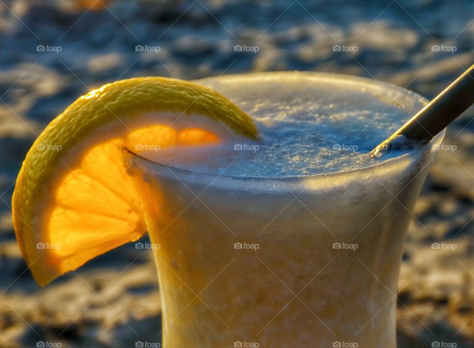 Cocktails At Sunset. Piña Colada In The Light Of The Golden Hour
