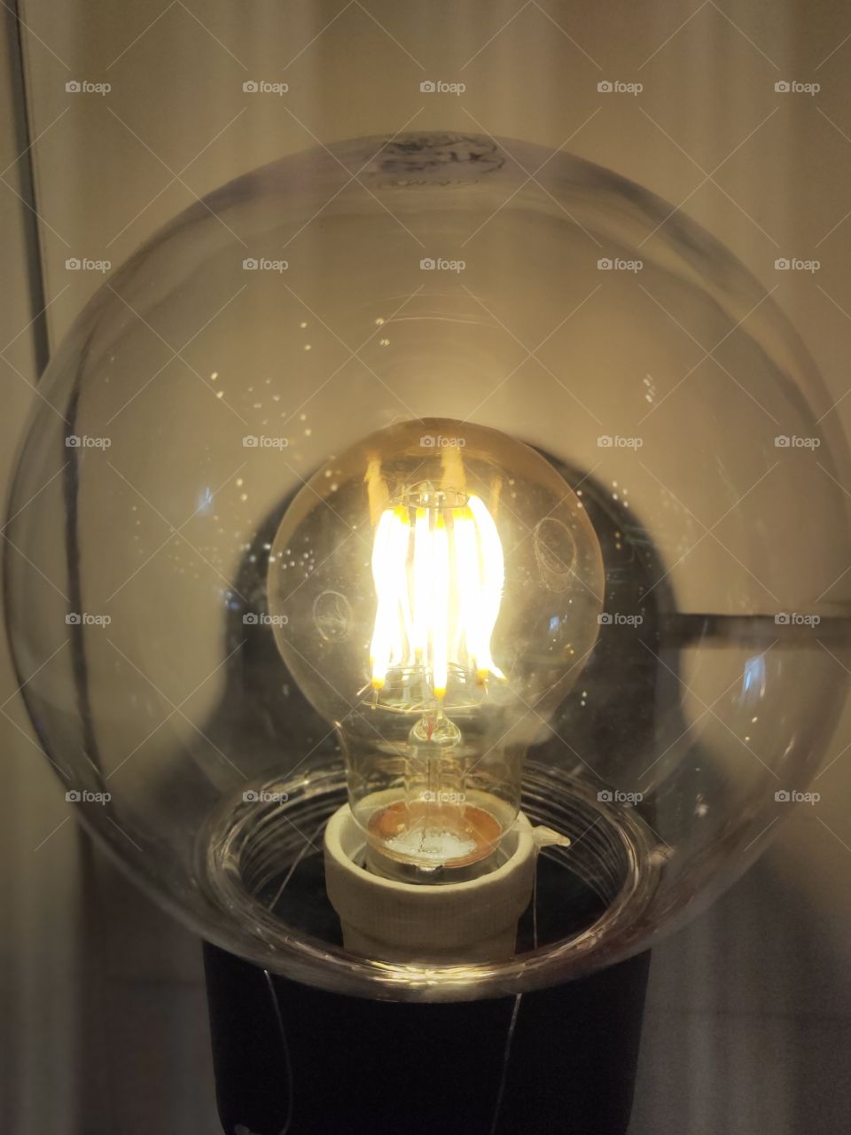 bright yellow lights that are very beautiful to look at. with a round convex shield