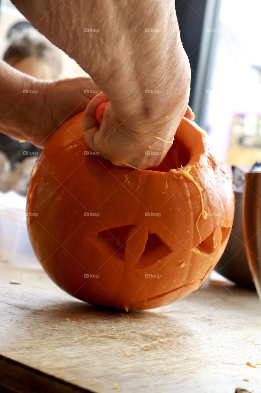 Carving Halloween pumpkin 
